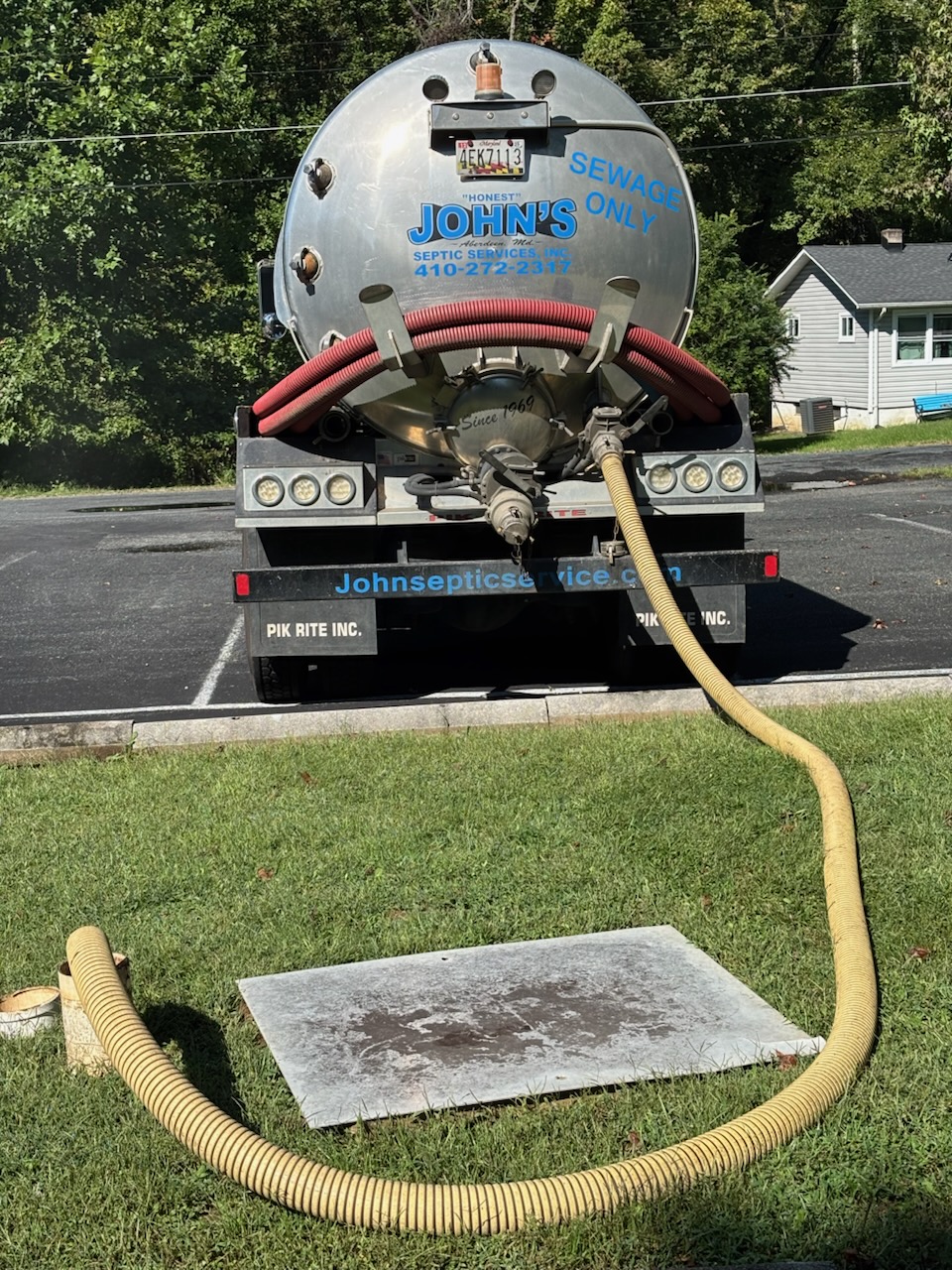 septic service truck pumping commercial septic tank Harford County MD